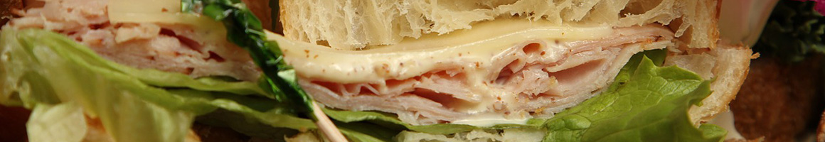 Eating Sandwich at Flemings Sub Base restaurant in Harrisburg, PA.